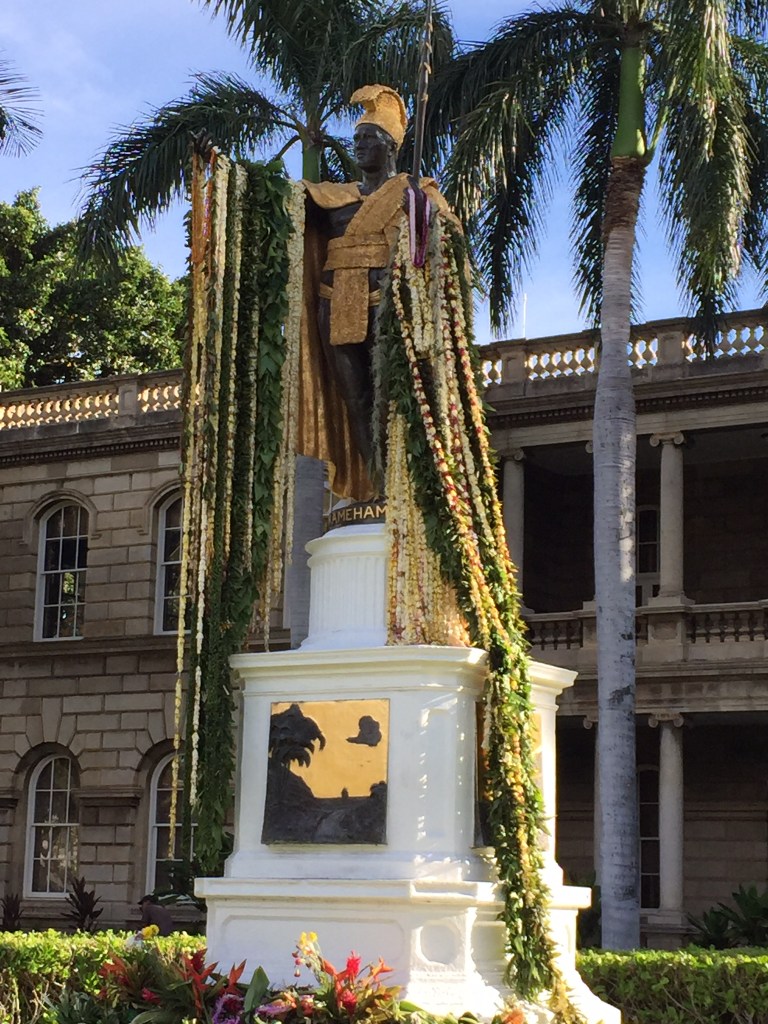 Kamehameha with leis